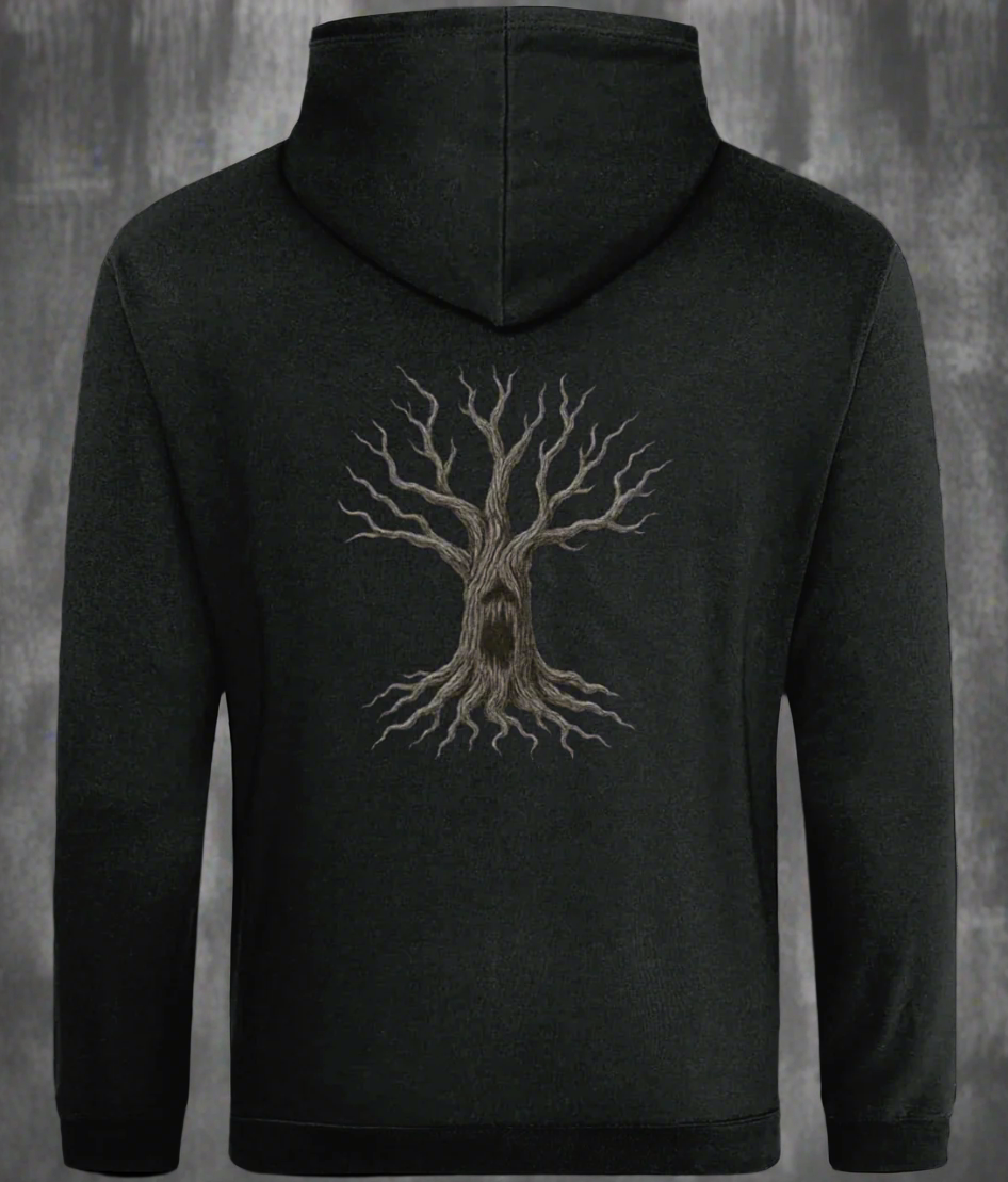 Black hoodie with a tree design on the back against a textured grey background
